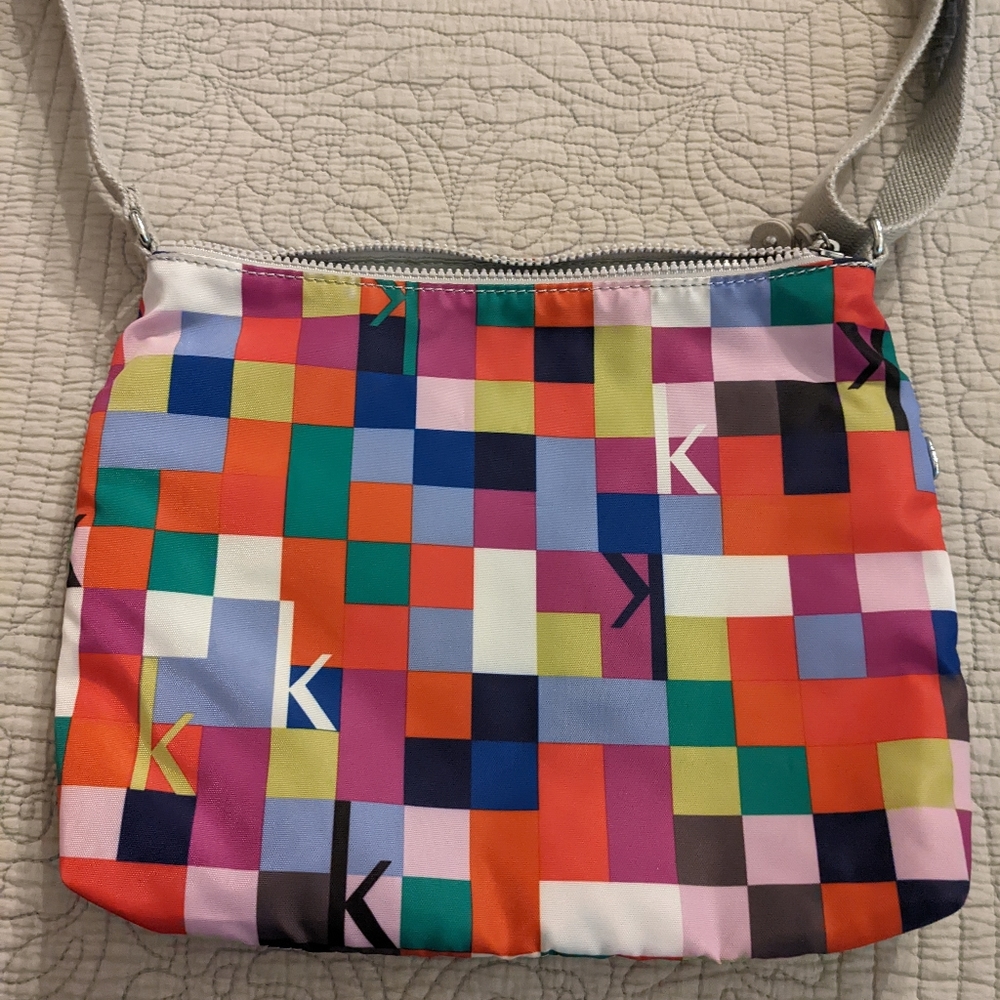 Gently used Kipling multicolored cross body medium purse